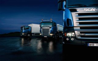 Three-trucks-on-blue-background-320x200.jpg